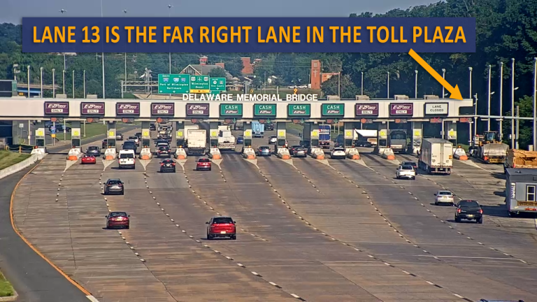A Wide Load is in Lane 13 at the Delaware Memorial Bridge, this image shows you where Lane 13 is with text and an arrow identifying the vehicle and lane 13.
