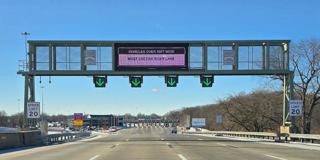Wide load and oversized vehicle must use the right most lane when entering the Delaware Memorial Bridge Toll Plaza